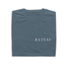Folded navy Bateau restaurant t-shirt